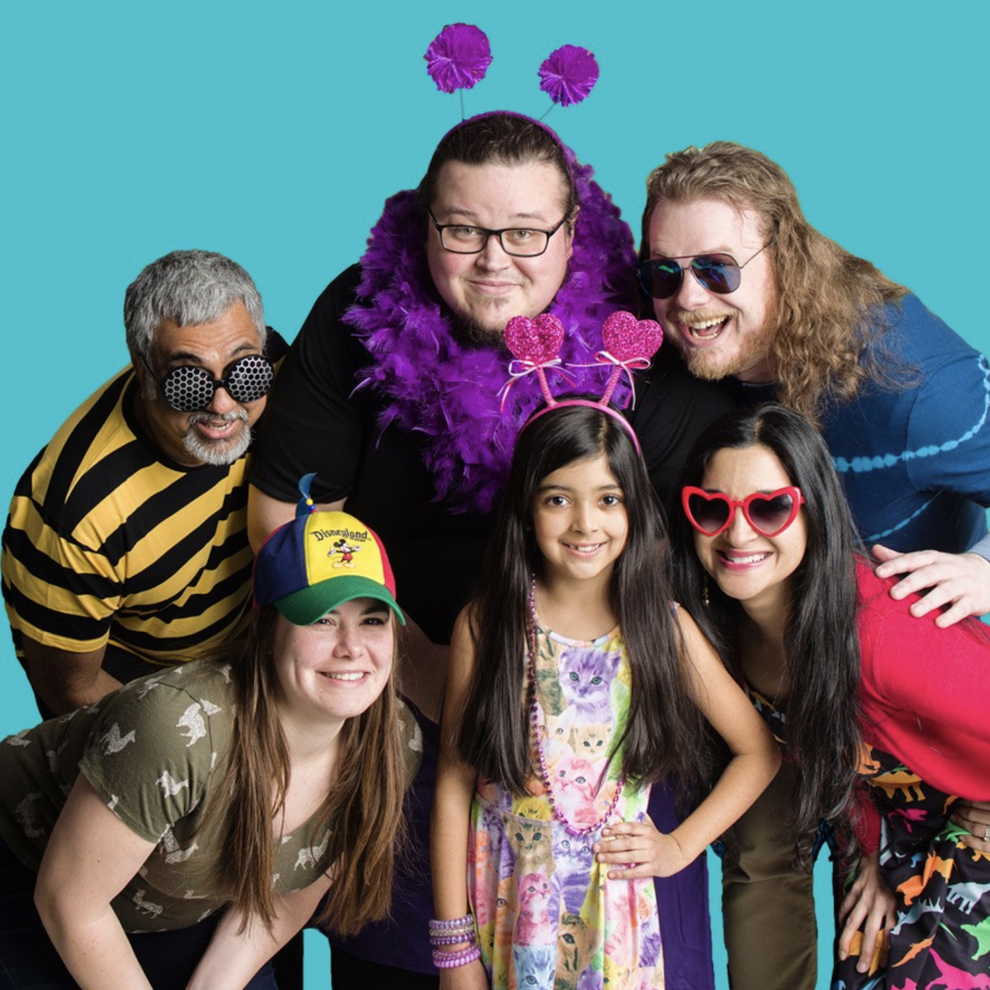 Band members from The Kid-Ups against a blue background