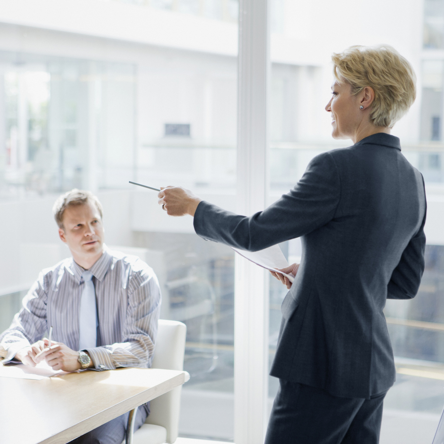 Person giving a presentation in a meeting room