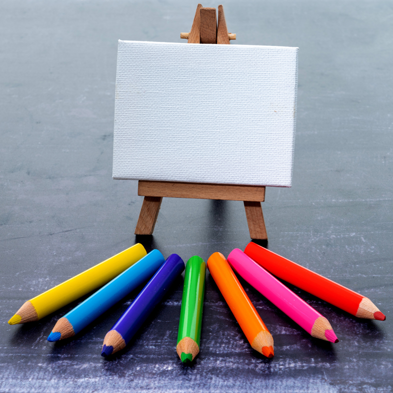 Tiny canvas and colored pencils