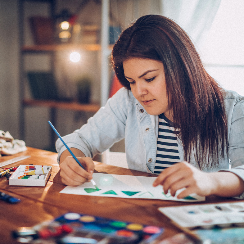 Teenage girl painting