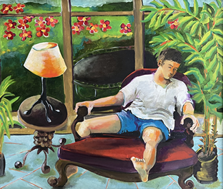 Man sitting in a chair near plants