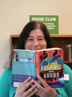 Jennifer holding book, Arsenic and Adobo