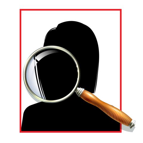 Person's shadow and magnifying glass