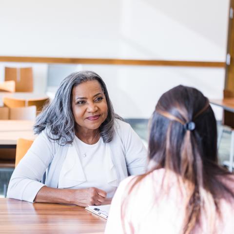 Woman being interviewed