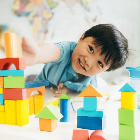 Young boy playing with blocks