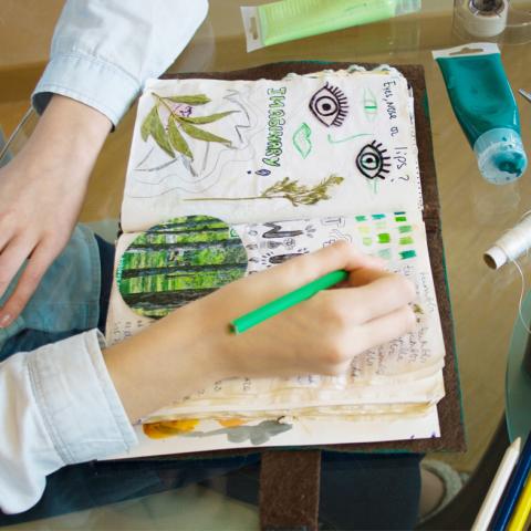 Person working on DIY magazine