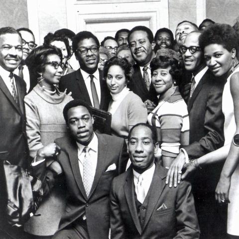 black and white image of Alice Tregay with other activists