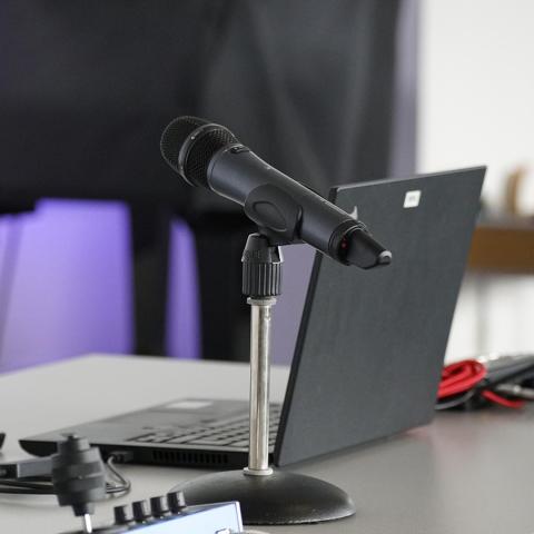Podcast microphone and laptop