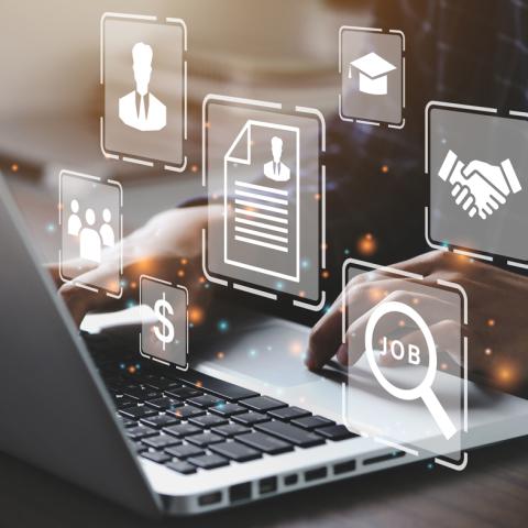 Laptop with business icons