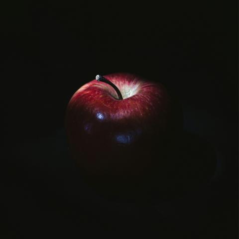 Apple on black background