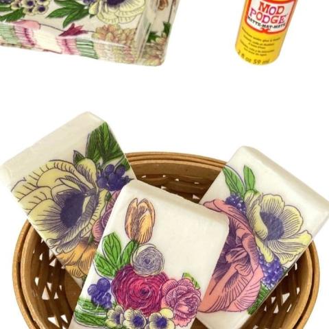 Decorated soap, stack of napkins and bottle of Mod Podge
