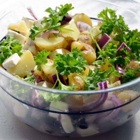Potato salad with cheese and vegetables
