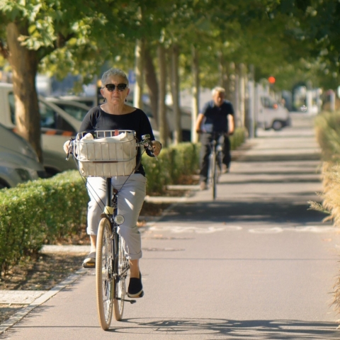 Older woman bicycling