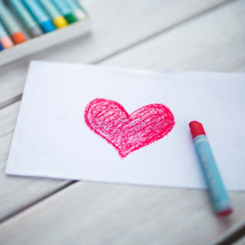 heart on paper drawn with crayon