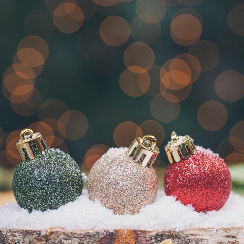 Holiday ornaments on snow
