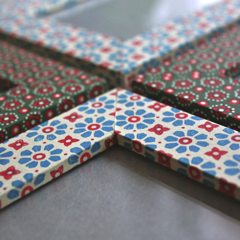 Picture frames painted in floral patterns