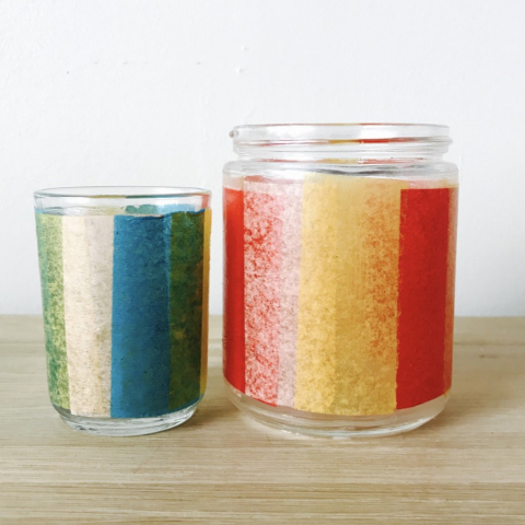 Glass jar candle holders decorated with colored tissue paper