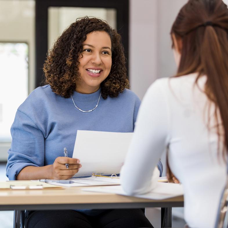 Women reviewing resume