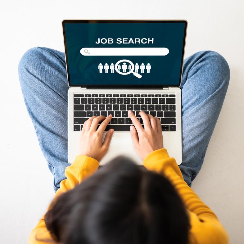 Woman searching jobs on a laptop