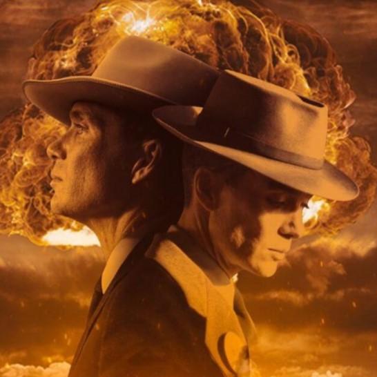 Scientist looking two directions with bomb's cloud behind