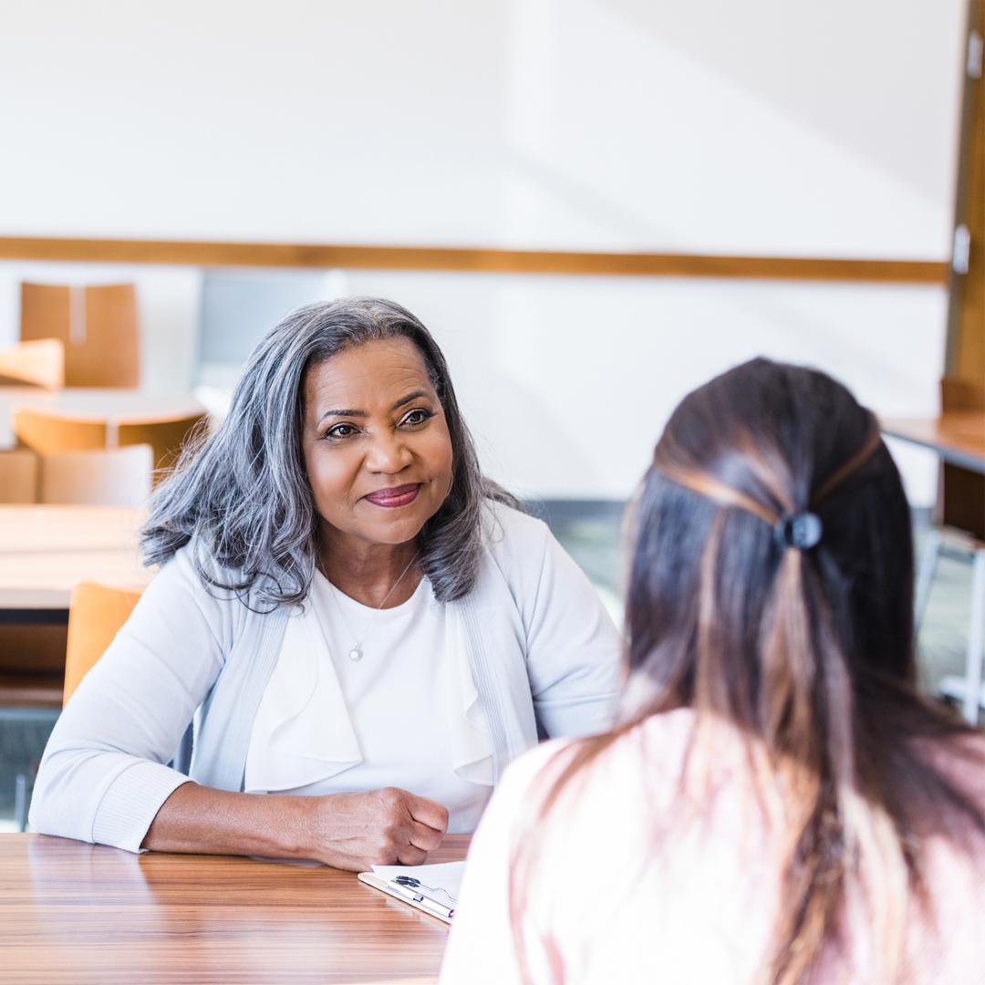 Woman being interviewed