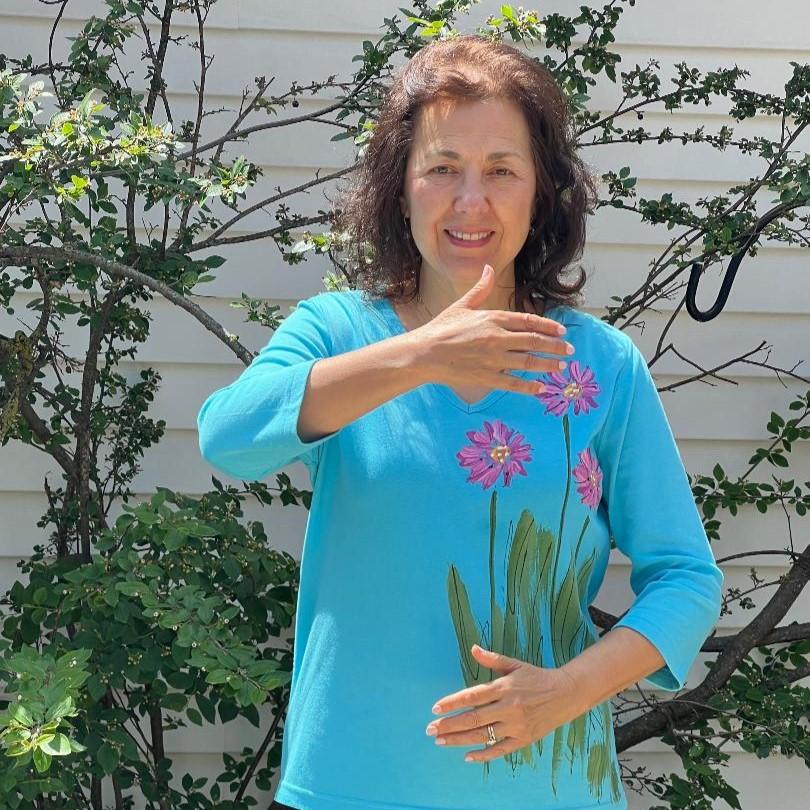Woman leading Qigong practice