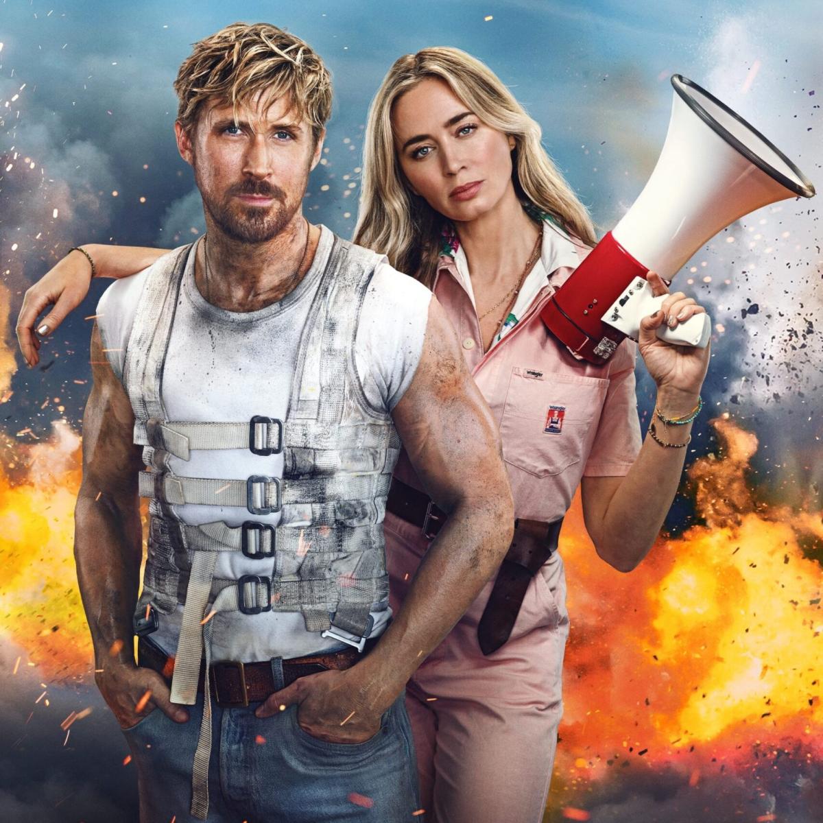 Stunt man and director with explosion in the background