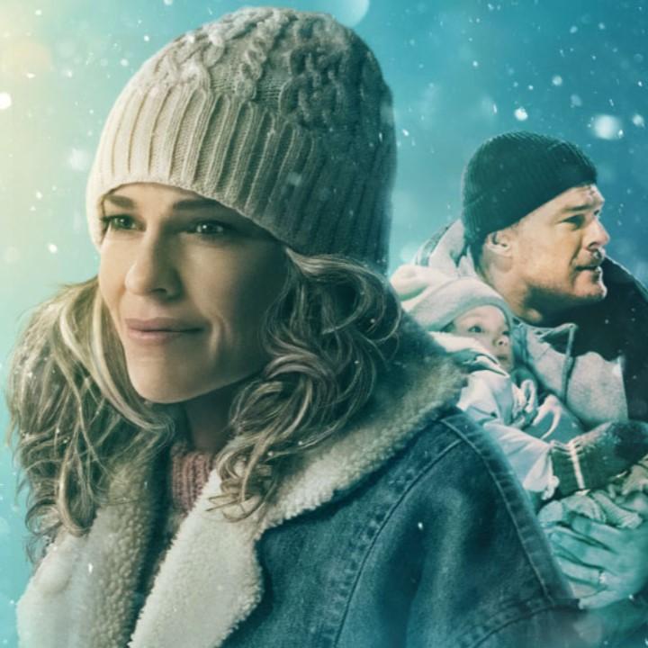 Woman, man holding girl