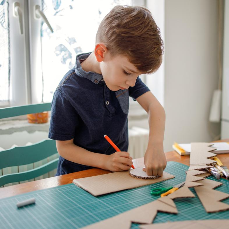 Child tracing cardboard