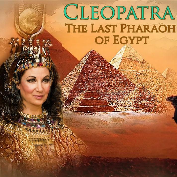 Actress Martina Mathisen portraying Cleopatra with pyramids in the background