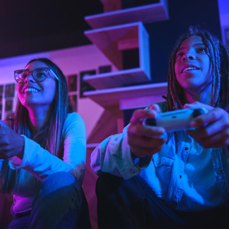 Two teens playing videogames