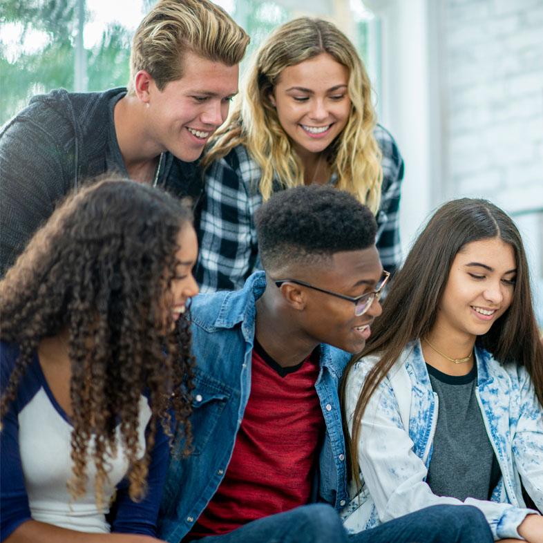 Teens sitting in a group