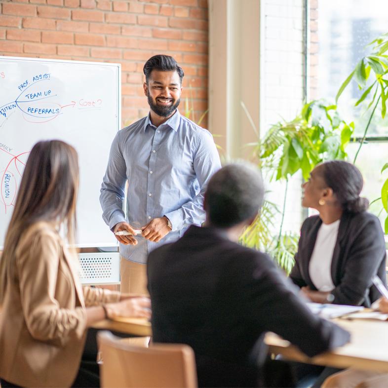 Man presenting at business meeting