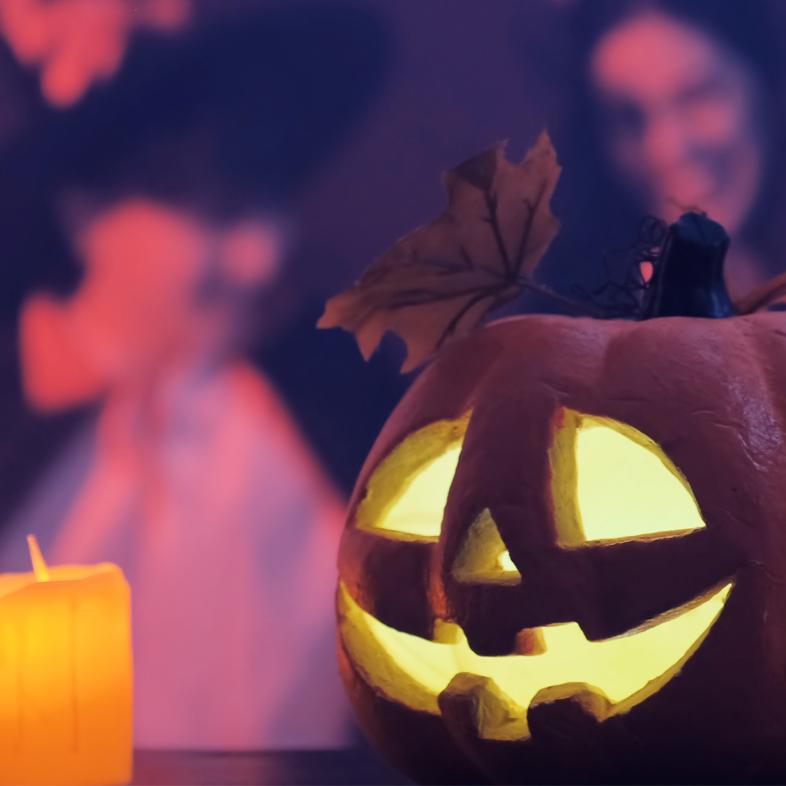 Glowing Jack-o-lantern and candle