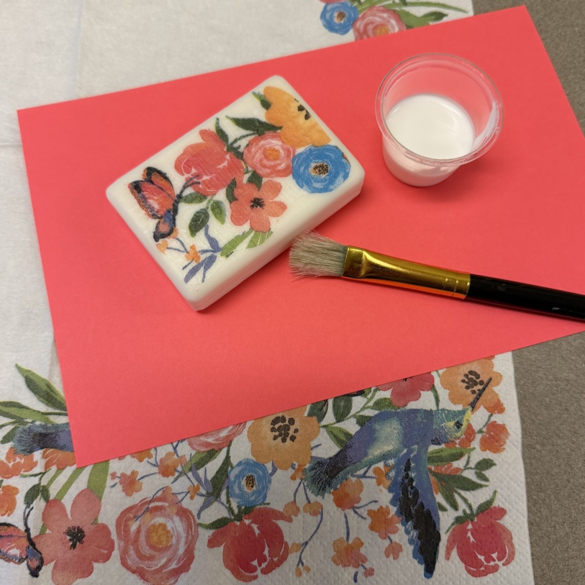 Decorated soap, napkin, brush and container of Mod Podge
